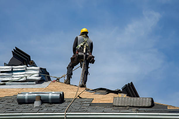 Professional Roofing technician working in Wyandanch, NY